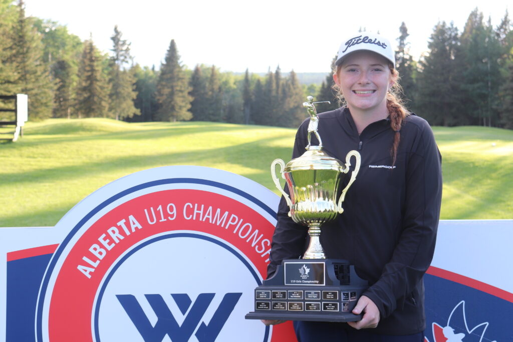 Saylar May holding U19 Girl's Trophy